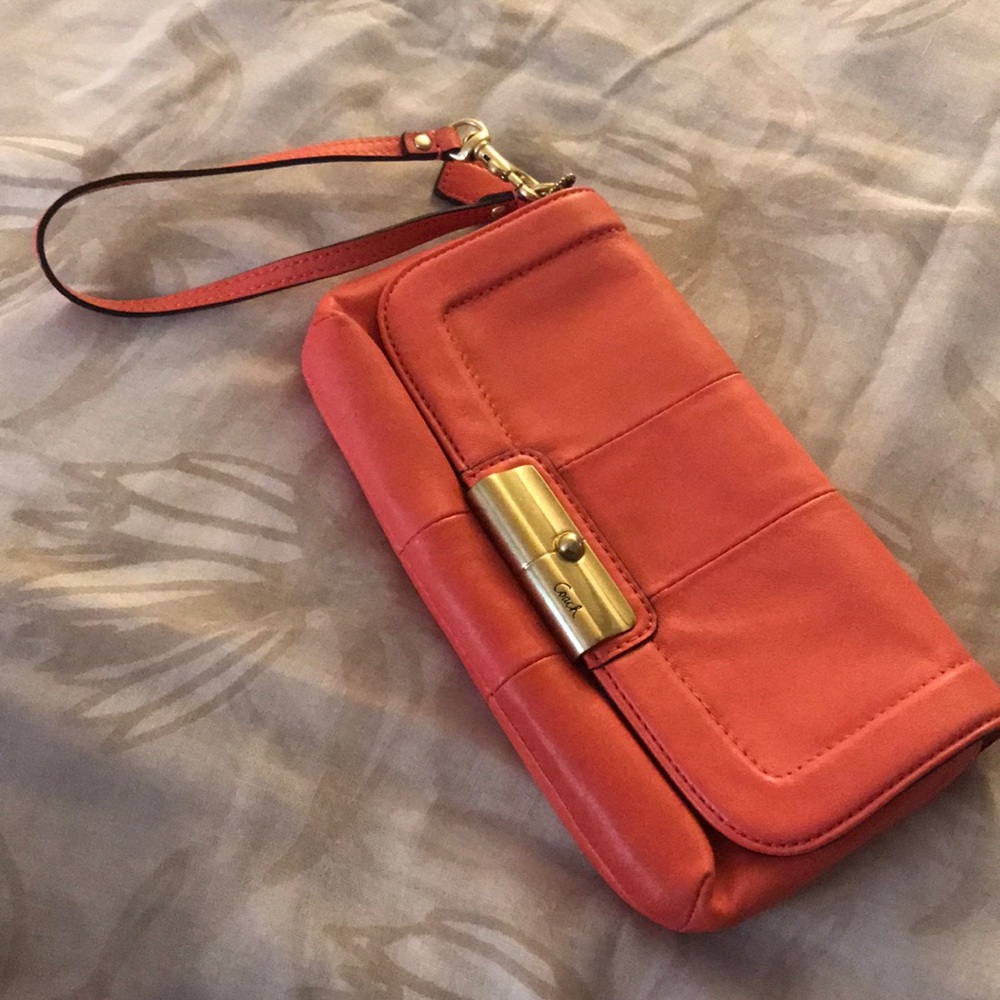 Coral Coach Clutch Wristlet